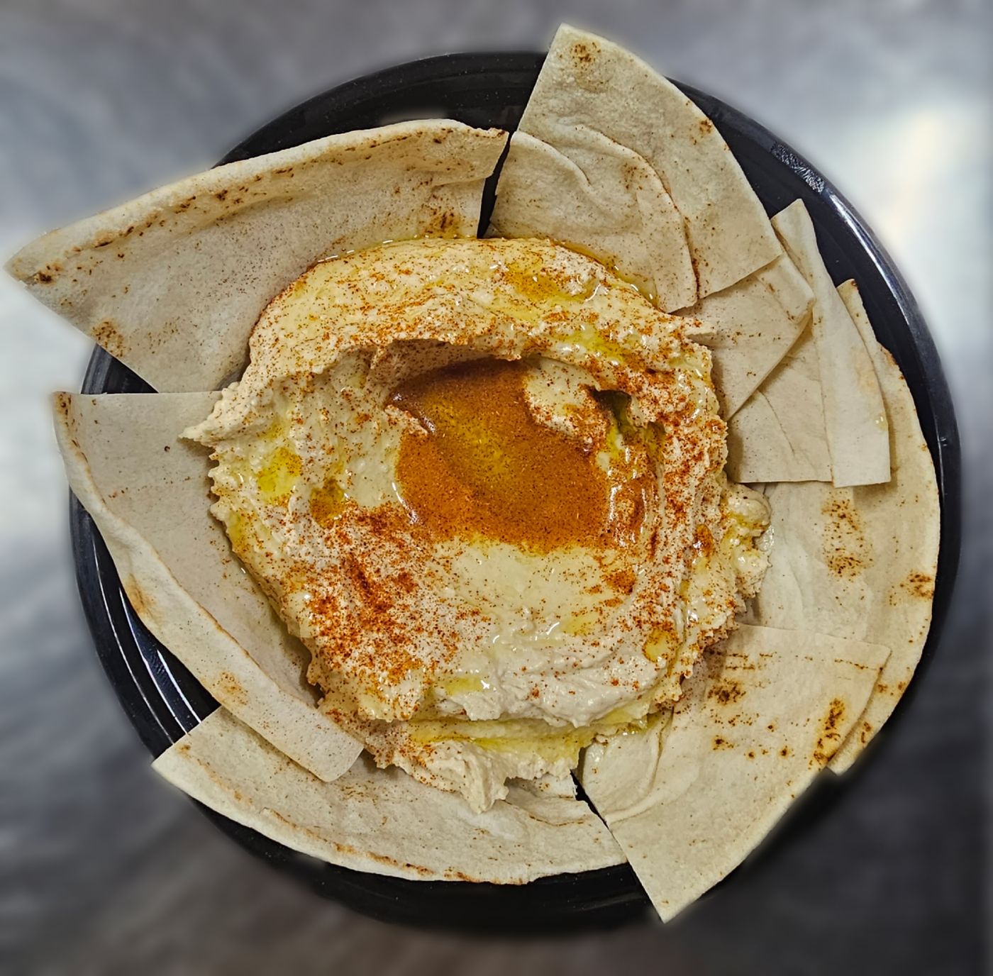 Hummus bowl with pita